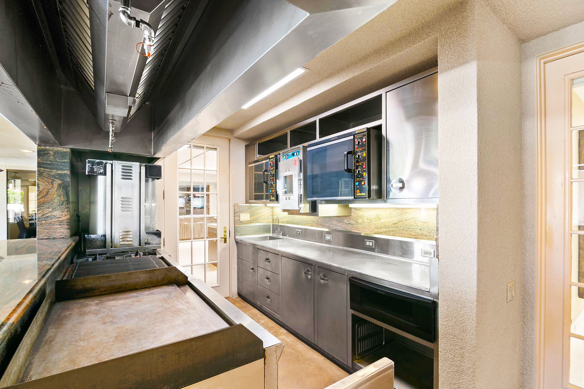 Delgado Estate Incredible 15 BR, 30,000' Estate on 2 Acres | Photo 18