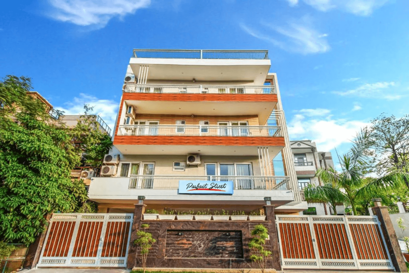 The building entrance with an inviting and well-lit design, offering a welcoming and accessible point of access
