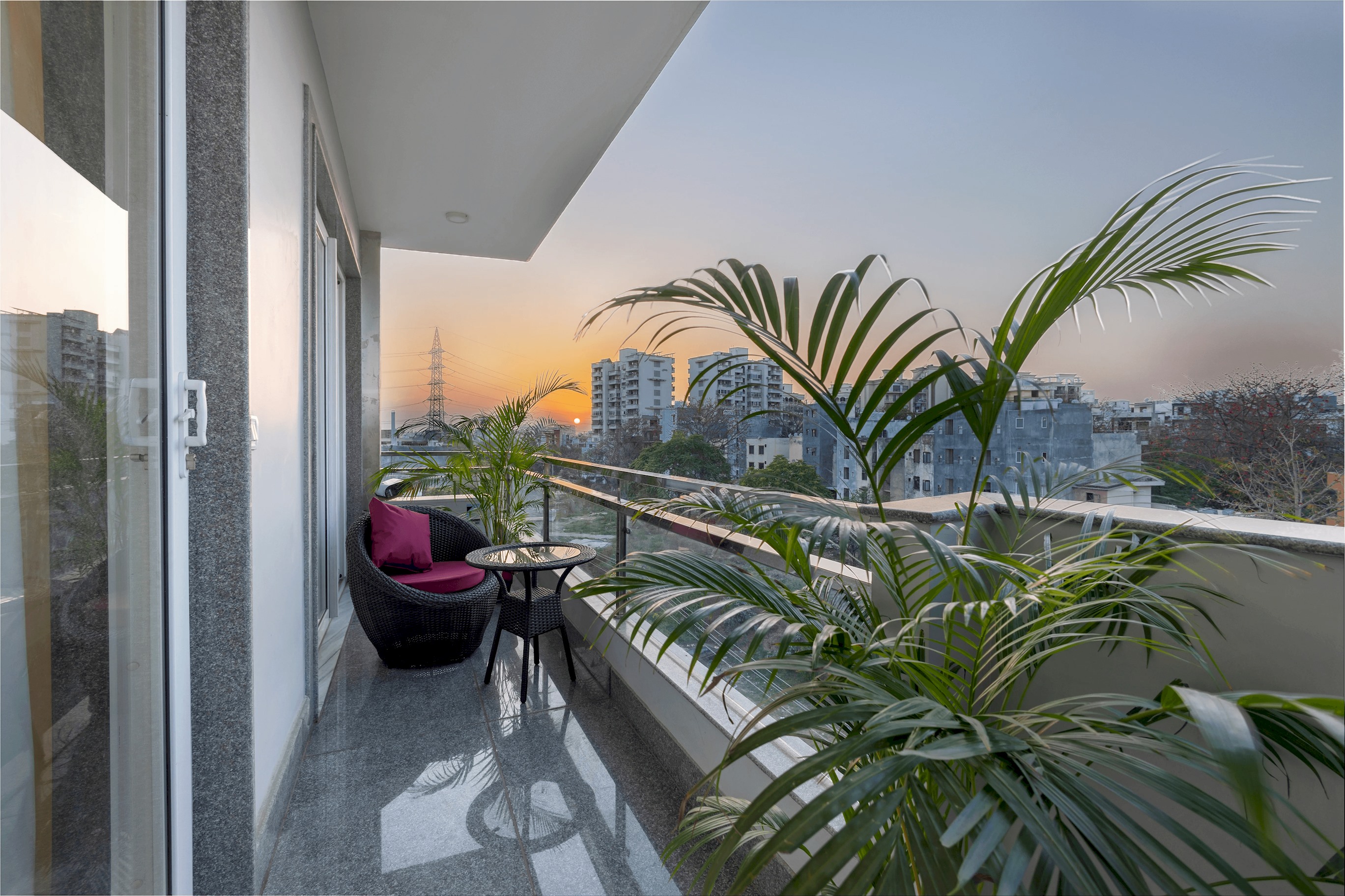 A serene balcony scene with a cup of tea, inviting relaxation and contemplation with a soothing view