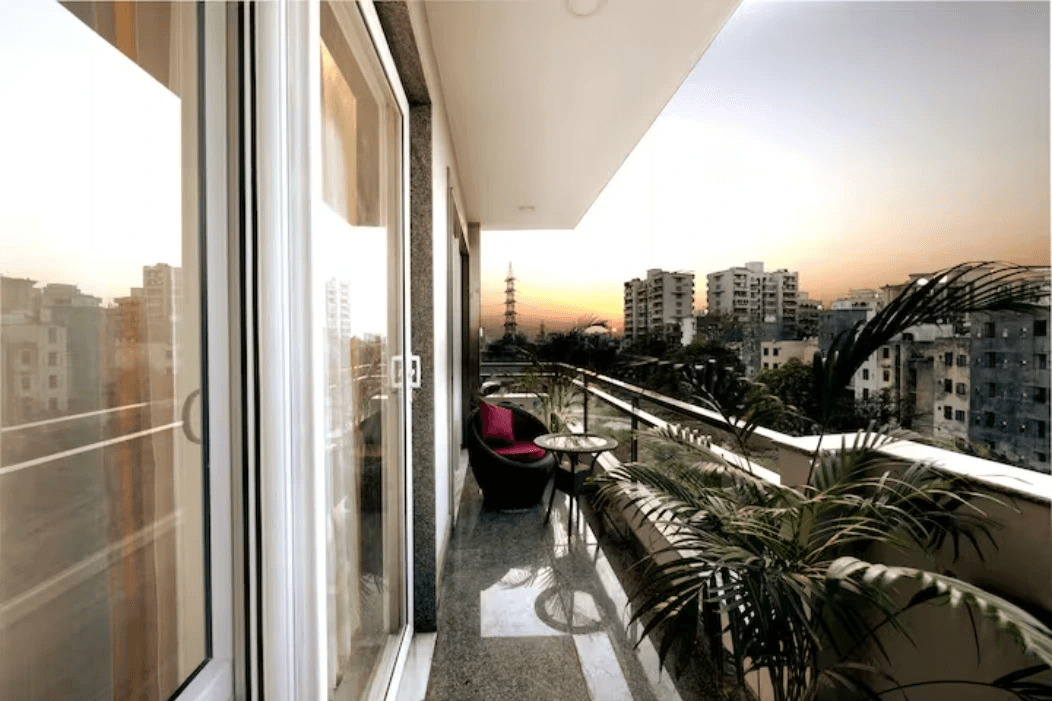 Step outside and savor the beauty of the world around you - where breathtaking views and fresh air create a peaceful escape, in the serene haven of your balcony