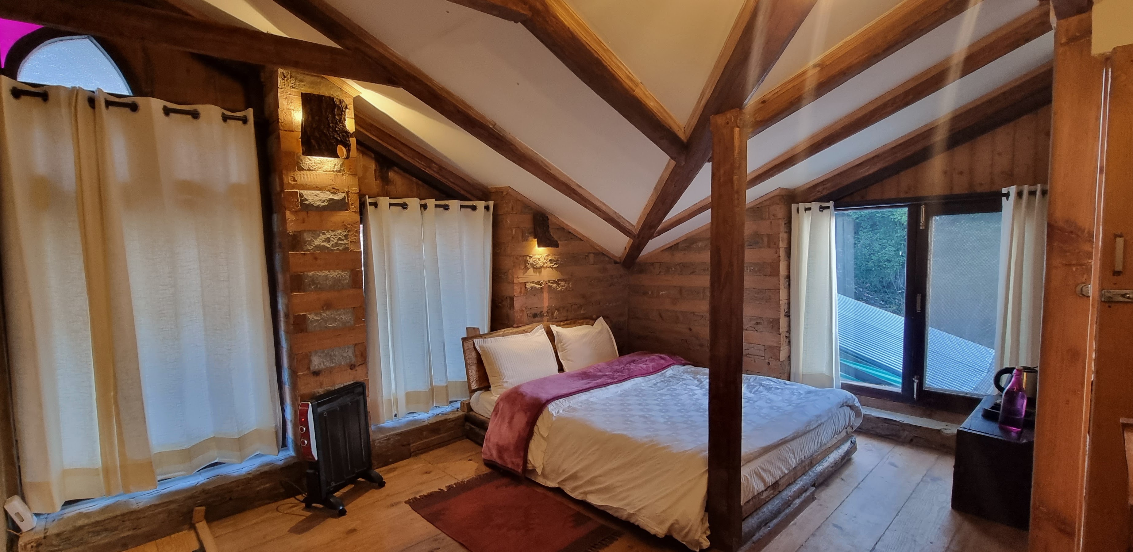 Wooden Attic Room at ART Village Naggar