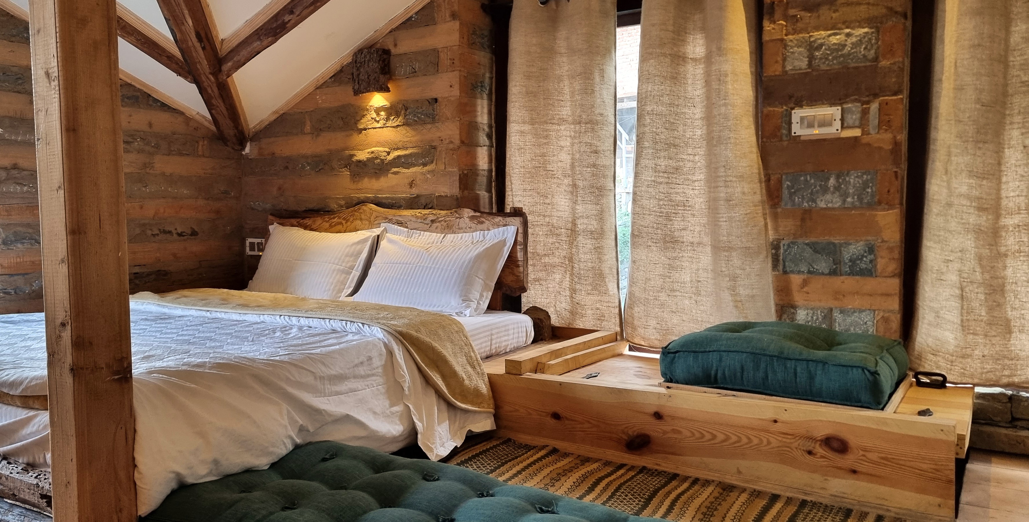Wooden Attic Room at ART Village Naggar